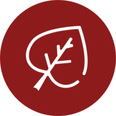 Translation missing: en.White leaf symbol on a red circular background