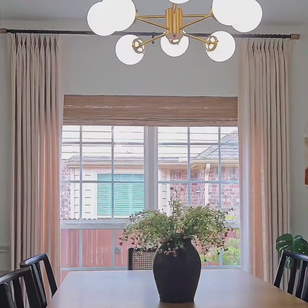 Elara linen curtains Video_1, elegant drapes in a dining room showcased to display the product's soft texture and graceful hanging effect video